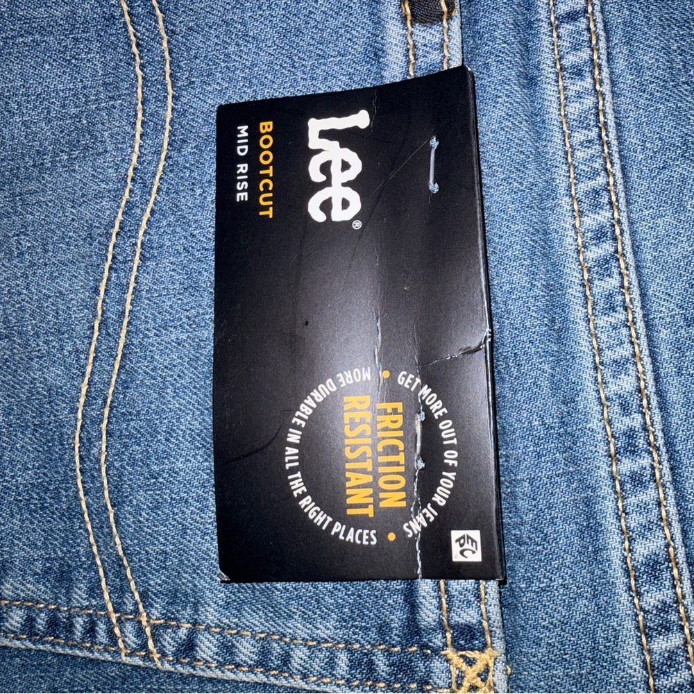 Lee Men's Bootcut Mid-Rise Jeans in Light Blue Denim